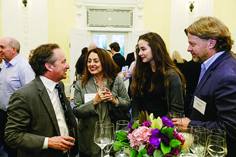 PLC members gathered in discussion at a PLC event