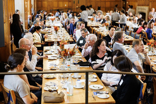 Attendees sitting together eating at a table during the 2024 PLC Fall Gathering