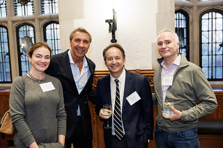 Group of attendees smiling and posing for picture with Pericles Lewis, Dean of Yale College, during 2024 PLC Fall Gathering